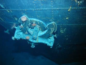 Port anchor secured in hawse pipe